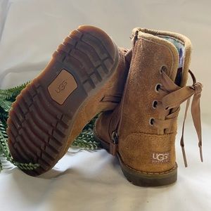 SOLD.     UGG lace back, side zippered boots